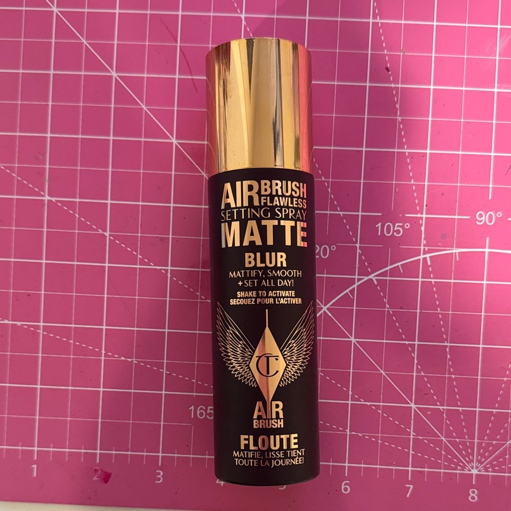 Charlotte Tilbury Airbrush Flawless Setting Spray in Black and Gold